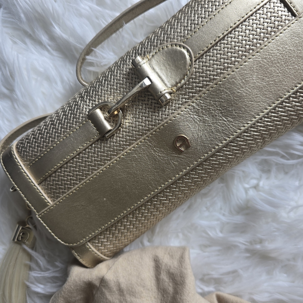 Gold Perforated Clutch with Sleek Metallic Finish